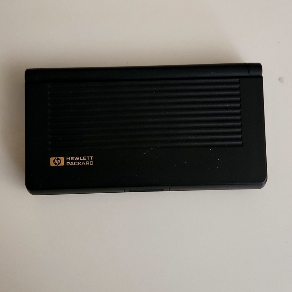 HP Hewlett-Packard VINTAGE 95LX Lotus 123, Palmtop PC Works! Looks like new!